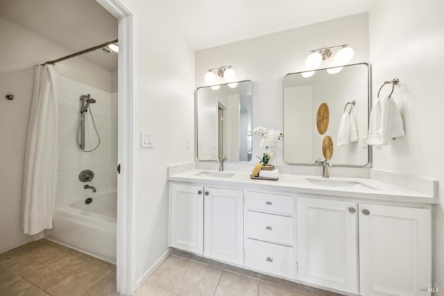 bathroom with a sink, double vanity, tile patterned flooring, and shower / bath combination with curtain