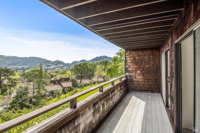 balcony featuring a mountain view