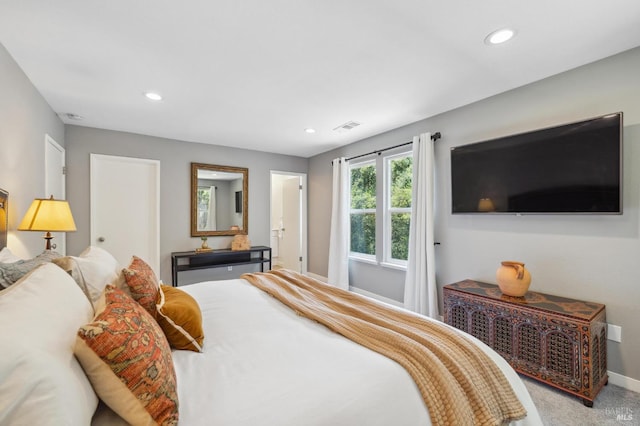 bedroom with carpet flooring, visible vents, and recessed lighting