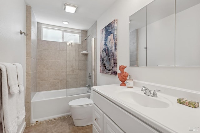 bathroom featuring toilet, vanity, shower / bath combination, and tile patterned floors