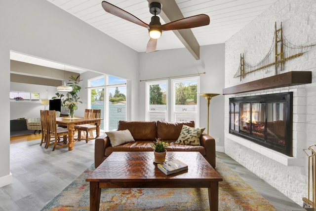 148 Kerns Ct, Napa, CA 94558 - living area featuring ceiling fan, a fireplace, wood finished floors, and beamed ceiling
