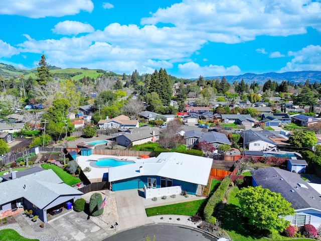 148 Kerns Ct, Napa, CA 94558 - aerial perspective of suburban area with a pool area and a mountainous background
