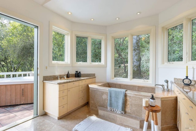 full bath with tile patterned floors, recessed lighting, and vanity