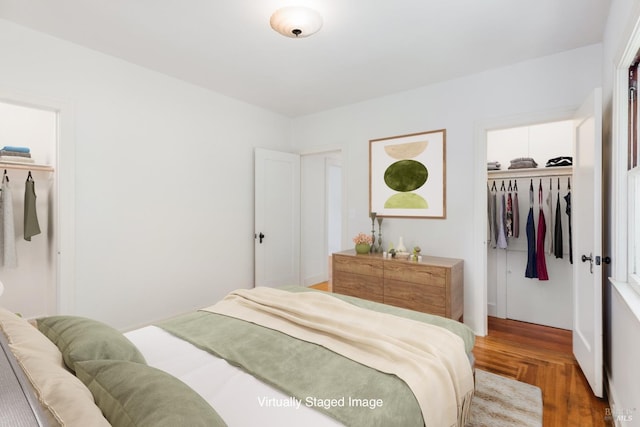 331 1st St, Healdsburg, CA 95448 - bedroom with a spacious closet, a closet, and wood finished floors