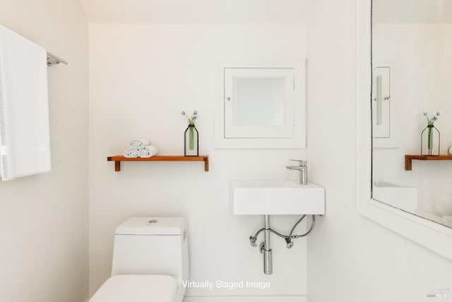331 1st St, Healdsburg, CA 95448 - half bathroom with toilet and a sink