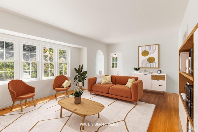 331 1st St, Healdsburg, CA 95448 - living room with light wood-type flooring and a healthy amount of sunlight