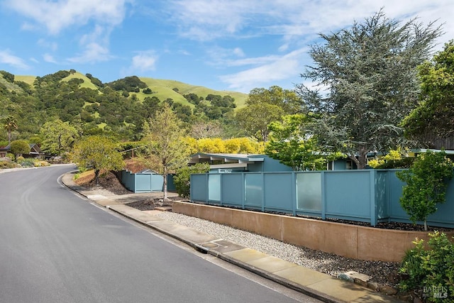 exterior space featuring sidewalks and curbs