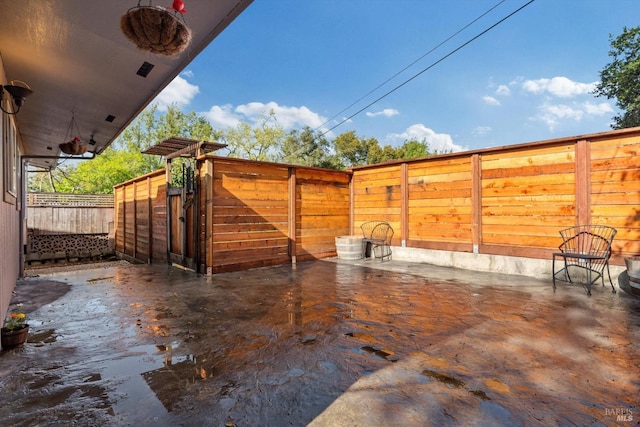 view of patio / terrace with fence