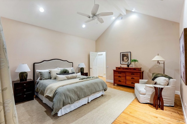 bedroom with high vaulted ceiling, beamed ceiling, baseboards, a ceiling fan, and light wood-style floors