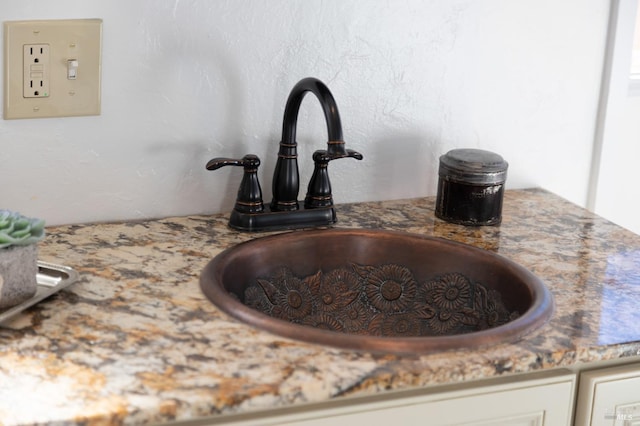 interior details featuring a sink