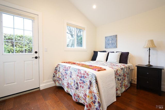 bedroom featuring recessed lighting, baseboards, wood finished floors, and vaulted ceiling