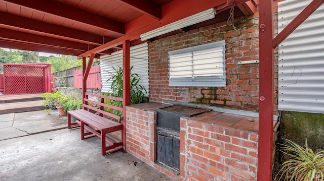 view of patio / terrace with fence