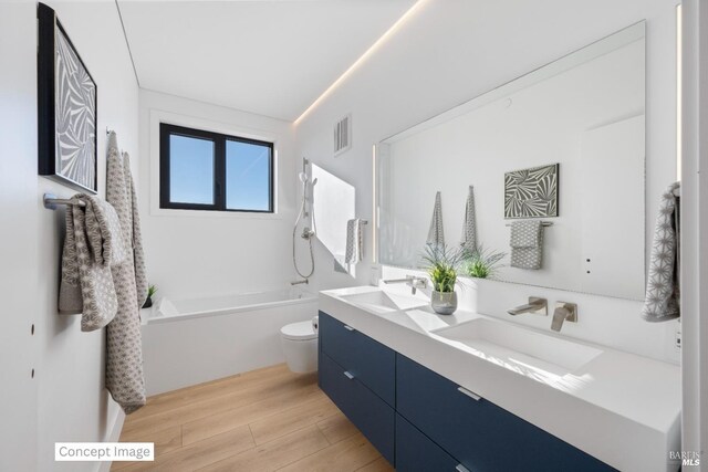 full bath with visible vents, wood finished floors, toilet, and a sink