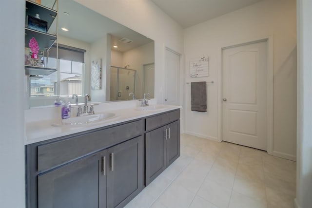 1108 Hiramatsu Ln, Winters, CA 95694 - bathroom featuring a stall shower, tile patterned flooring, double vanity, and a sink