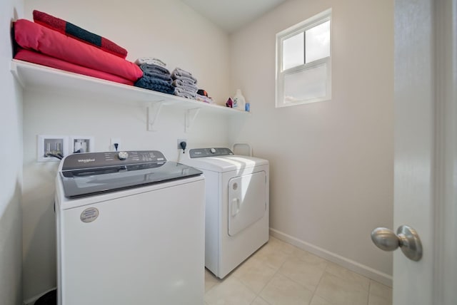 1108 Hiramatsu Ln, Winters, CA 95694 - laundry room with laundry area, washer and clothes dryer, baseboards, and light tile patterned flooring