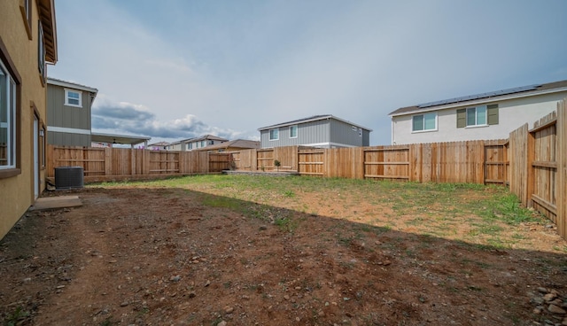1108 Hiramatsu Ln, Winters, CA 95694 - view of yard featuring central air condition unit and a fenced backyard