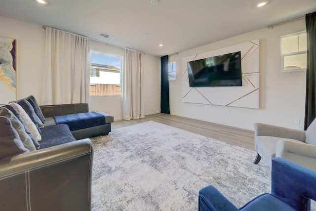 1108 Hiramatsu Ln, Winters, CA 95694 - living room featuring recessed lighting, plenty of natural light, visible vents, and wood finished floors