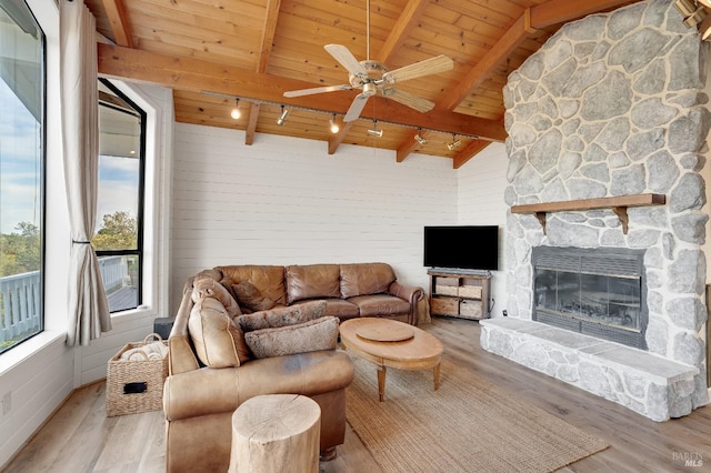 living room featuring wood ceiling, ceiling fan, lofted ceiling with beams, and wood finished floors