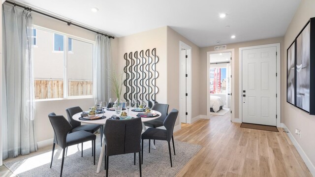 1096 Fiano Pl, Manteca, CA 95337 - dining area with light wood finished floors, recessed lighting, and baseboards
