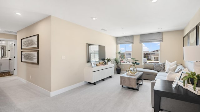 1096 Fiano Pl, Manteca, CA 95337 - living area with light colored carpet, baseboards, and recessed lighting