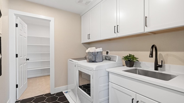 1096 Fiano Pl, Manteca, CA 95337 - laundry room featuring washing machine and dryer, cabinet space, and baseboards