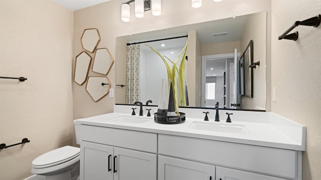 1096 Fiano Pl, Manteca, CA 95337 - full bath featuring toilet, double vanity, and curtained shower
