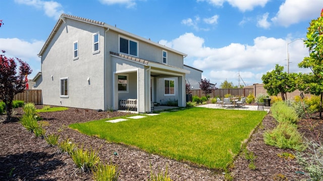 1096 Fiano Pl, Manteca, CA 95337 - back of property featuring a patio area and stucco siding