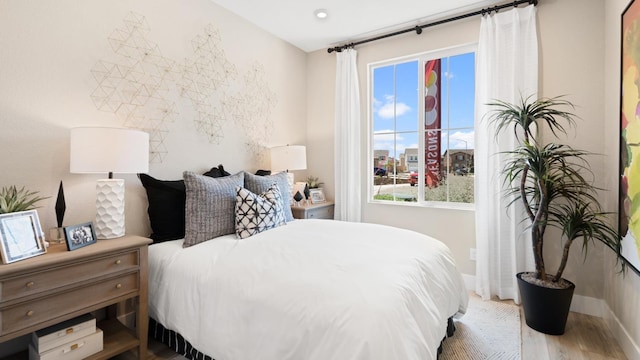 1096 Fiano Pl, Manteca, CA 95337 - bedroom featuring baseboards and wood finished floors