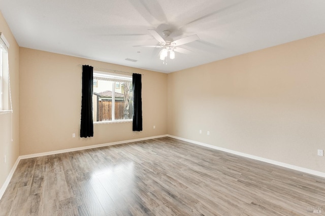 8568 Pinehollow Cir, Discovery Bay, CA 94505 - unfurnished room with ceiling fan, light wood-style floors, and baseboards