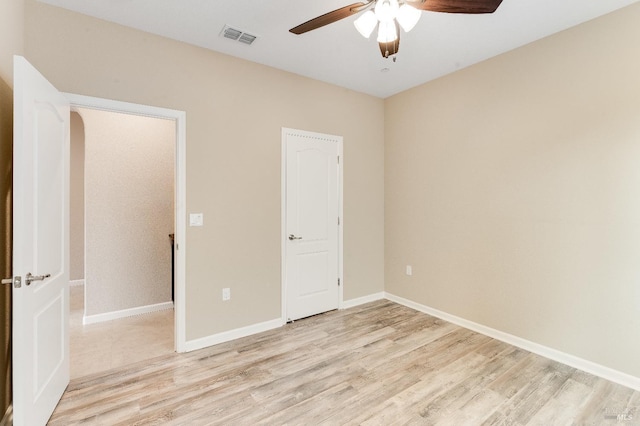 8568 Pinehollow Cir, Discovery Bay, CA 94505 - unfurnished bedroom featuring light wood finished floors, a ceiling fan, and baseboards