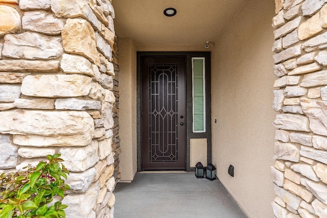8568 Pinehollow Cir, Discovery Bay, CA 94505 - entrance to property featuring stone siding and stucco siding