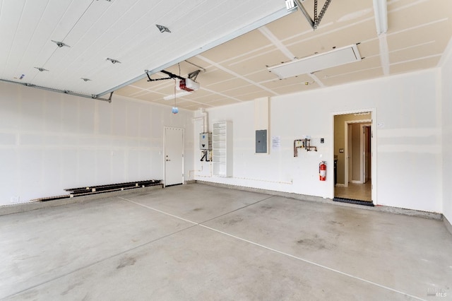8568 Pinehollow Cir, Discovery Bay, CA 94505 - garage featuring a garage door opener and electric panel