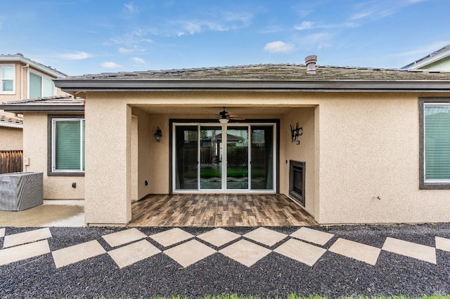 8568 Pinehollow Cir, Discovery Bay, CA 94505 - entrance to property featuring stucco siding, ceiling fan, central AC, and a patio