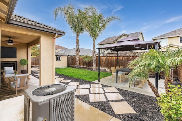 8568 Pinehollow Cir, Discovery Bay, CA 94505 - view of patio / terrace with a gazebo, central AC, a fenced backyard, and ceiling fan