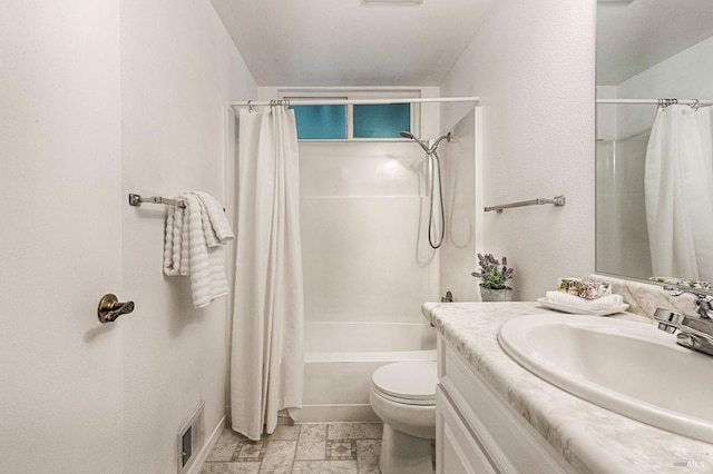 6574 Stone Bridge Rd, Santa Rosa, CA 95409 - full bath with visible vents, stone finish floor, toilet, vanity, and shower / tub combo