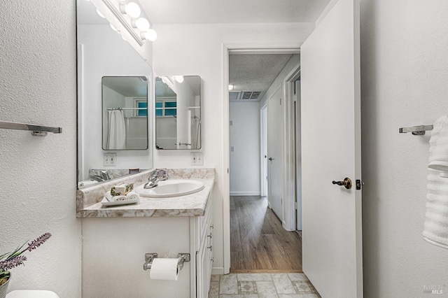 6574 Stone Bridge Rd, Santa Rosa, CA 95409 - full bathroom featuring vanity and visible vents