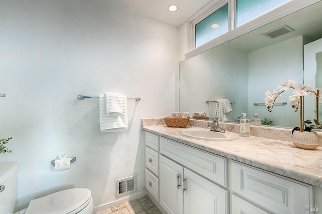 6574 Stone Bridge Rd, Santa Rosa, CA 95409 - half bath with baseboards, visible vents, toilet, and vanity