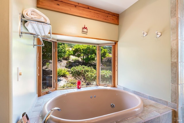 full bathroom featuring a tub with jets