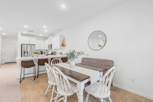 dining area featuring visible vents, recessed lighting, and baseboards