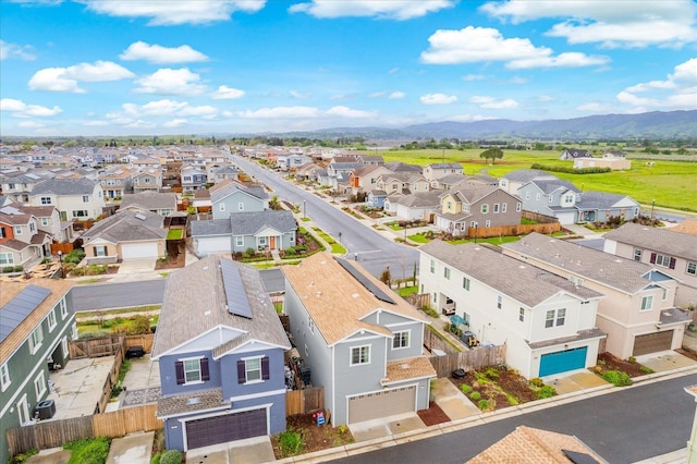 bird's eye view with a residential view and a mountain view