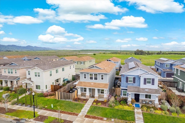 aerial view with a residential view and a mountain view