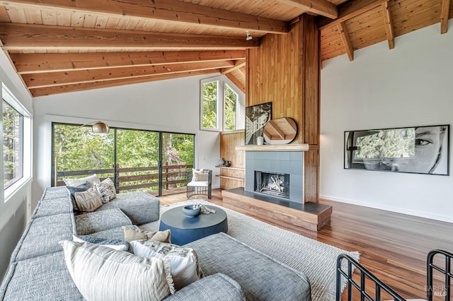 70 Black Log Rd, Kentfield, CA 94904 - living area featuring wood ceiling with exposed beams, plenty of natural light, a tile fireplace, wood finished floors, and high vaulted ceiling