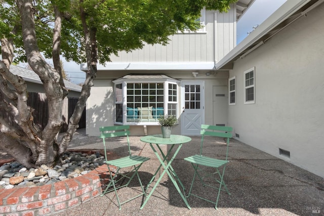 view of patio featuring visible vents