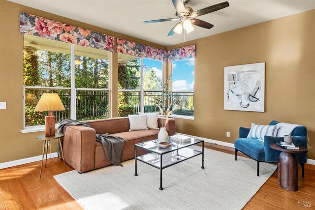 2909 Quail Hollow Dr, Fairfield, CA 94534 - living area featuring a ceiling fan, wood finished floors, and baseboards