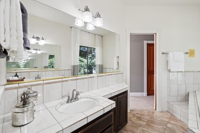 full bathroom with decorative backsplash and vanity
