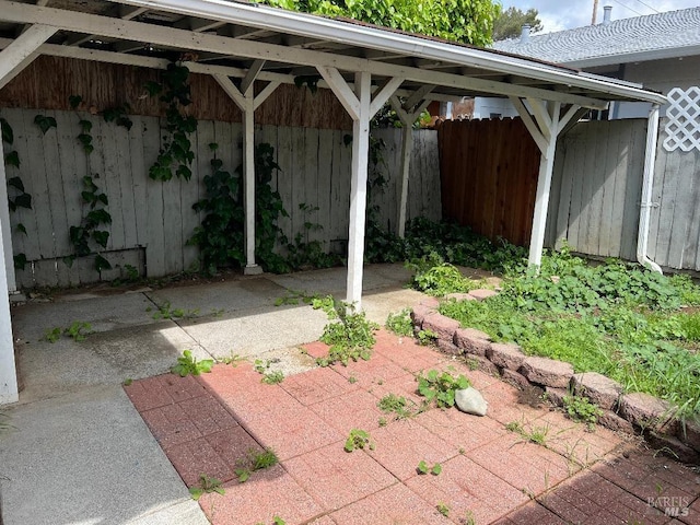 view of patio with fence