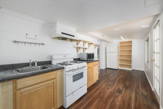kitchen with a sink, dark countertops, white appliances, dark wood-style floors, and under cabinet range hood