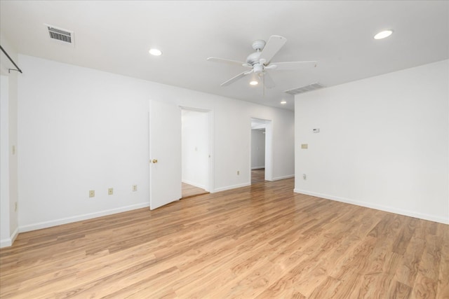 unfurnished room featuring visible vents, light wood-style flooring, a ceiling fan, and recessed lighting