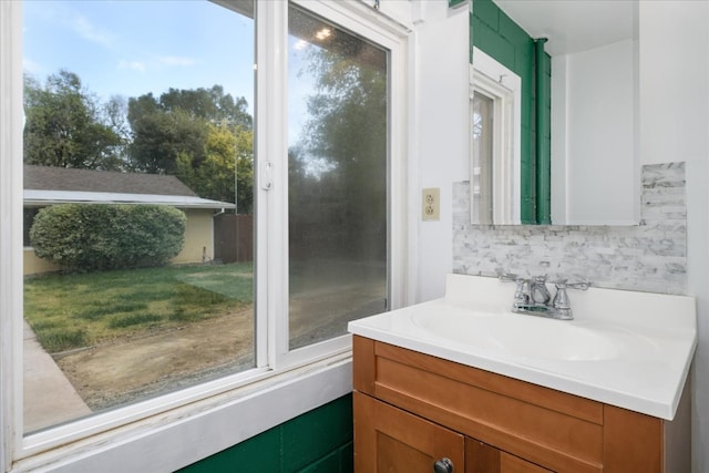 bathroom featuring backsplash and vanity
