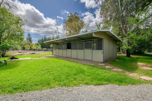 exterior space featuring an outbuilding and an exterior structure